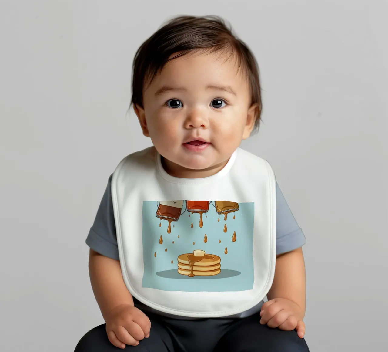 Simpatiche bottiglie che versano sciroppo sui pancake bavaglino da DesignDoodle