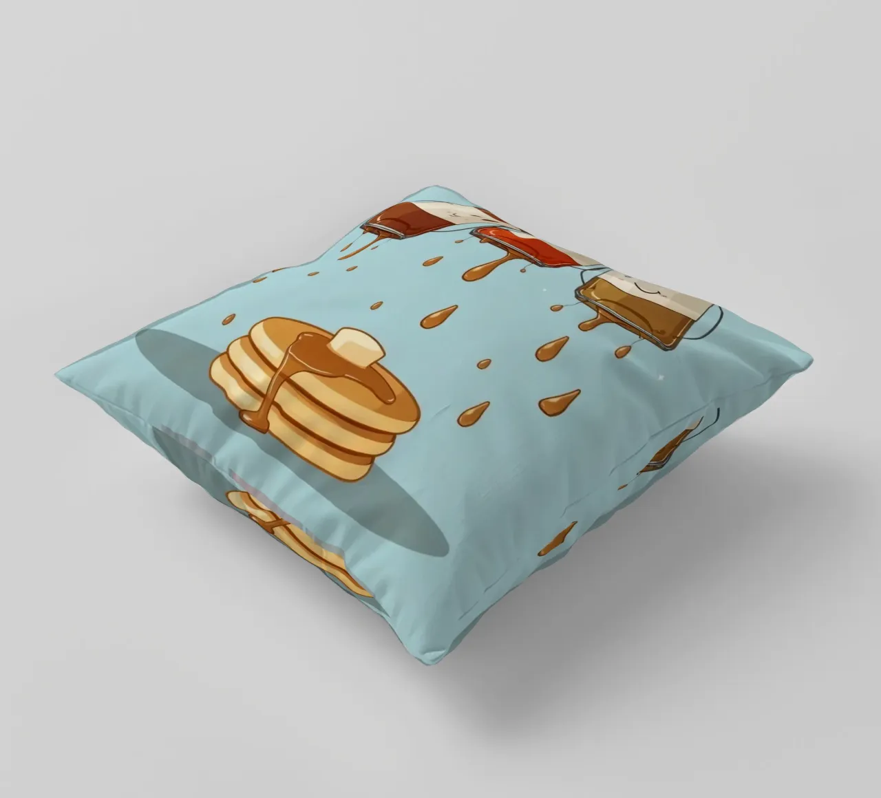 Simpatiche bottiglie che versano sciroppo sui pancake cuscino da DesignDoodle