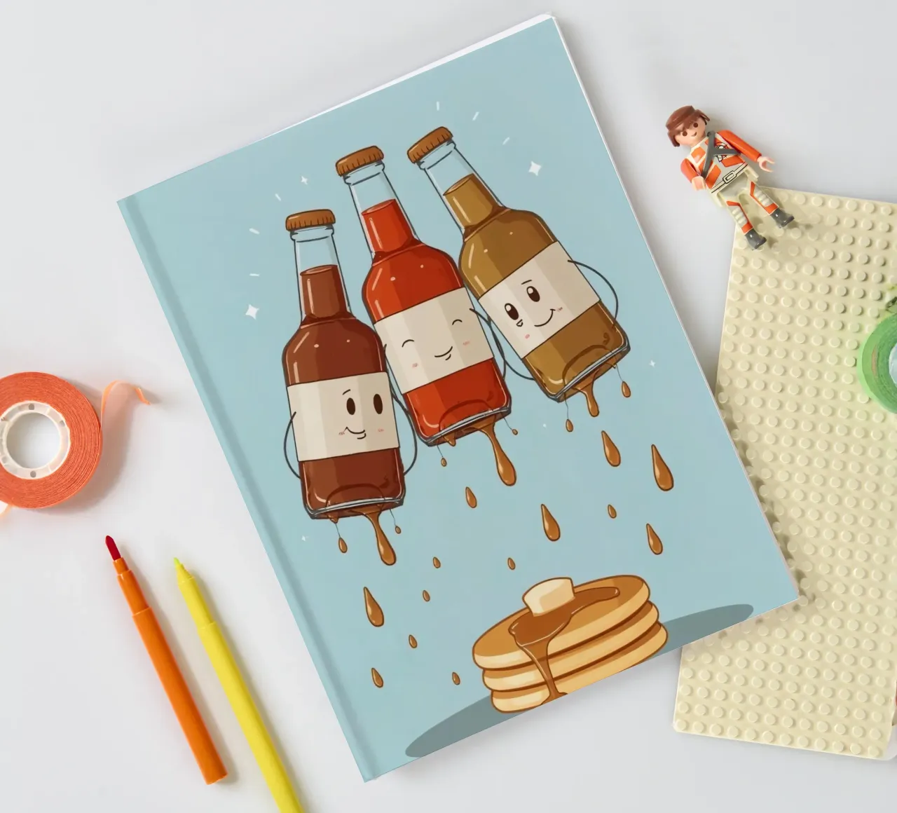 Simpatiche bottiglie che versano sciroppo sui pancake diario da DesignDoodle