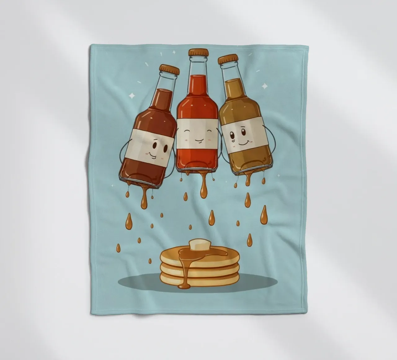 Simpatiche bottiglie che versano sciroppo sui pancake coperta in pile da DesignDoodle