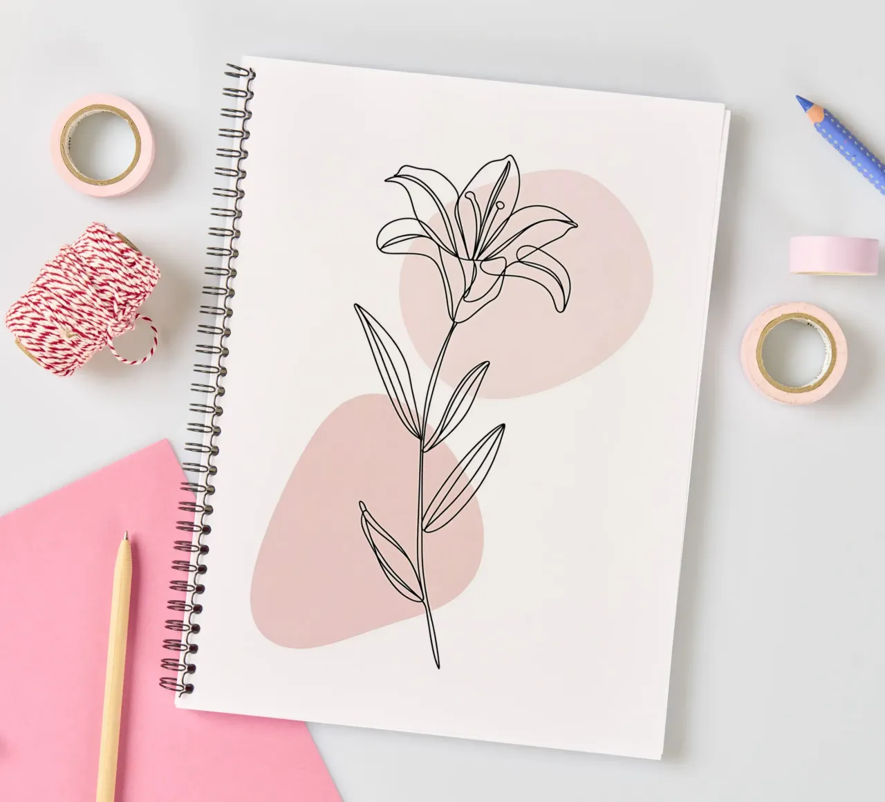 Minimalist Fleur de Lys in a continuous line spiral notebook by Plain Thoughts