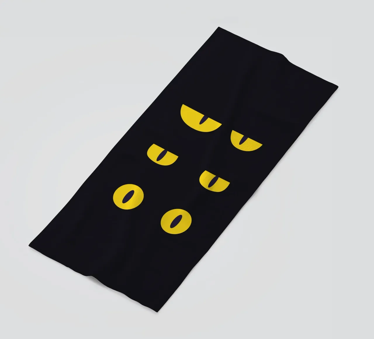 Lazy Cat Eye In The Dark beach towel by galihstudio