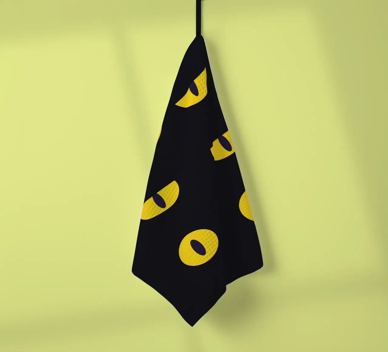 Lazy Cat Eye In The Dark tea towel by galihstudio