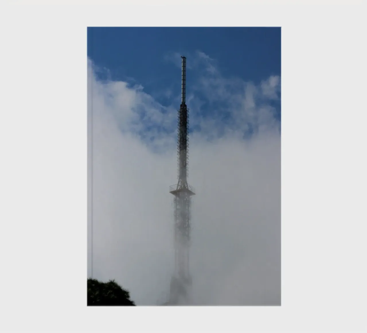 sky scape building in clouds notebook by comura