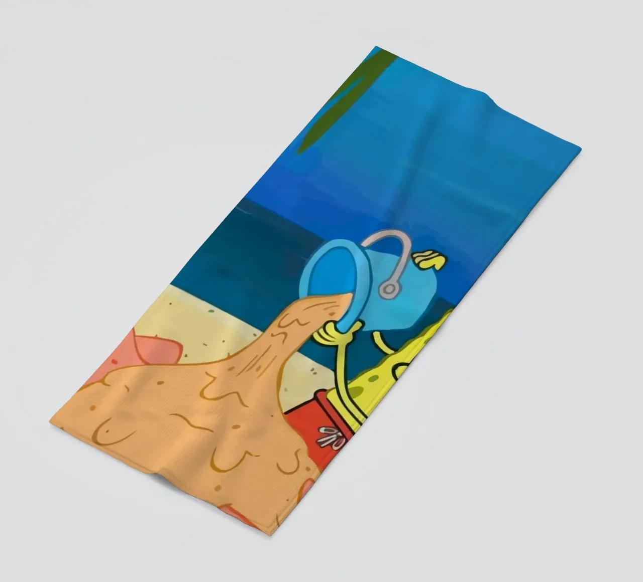 SpongeBob and Patrick playing in the sand on the beach serviette de plage de Dumery Art