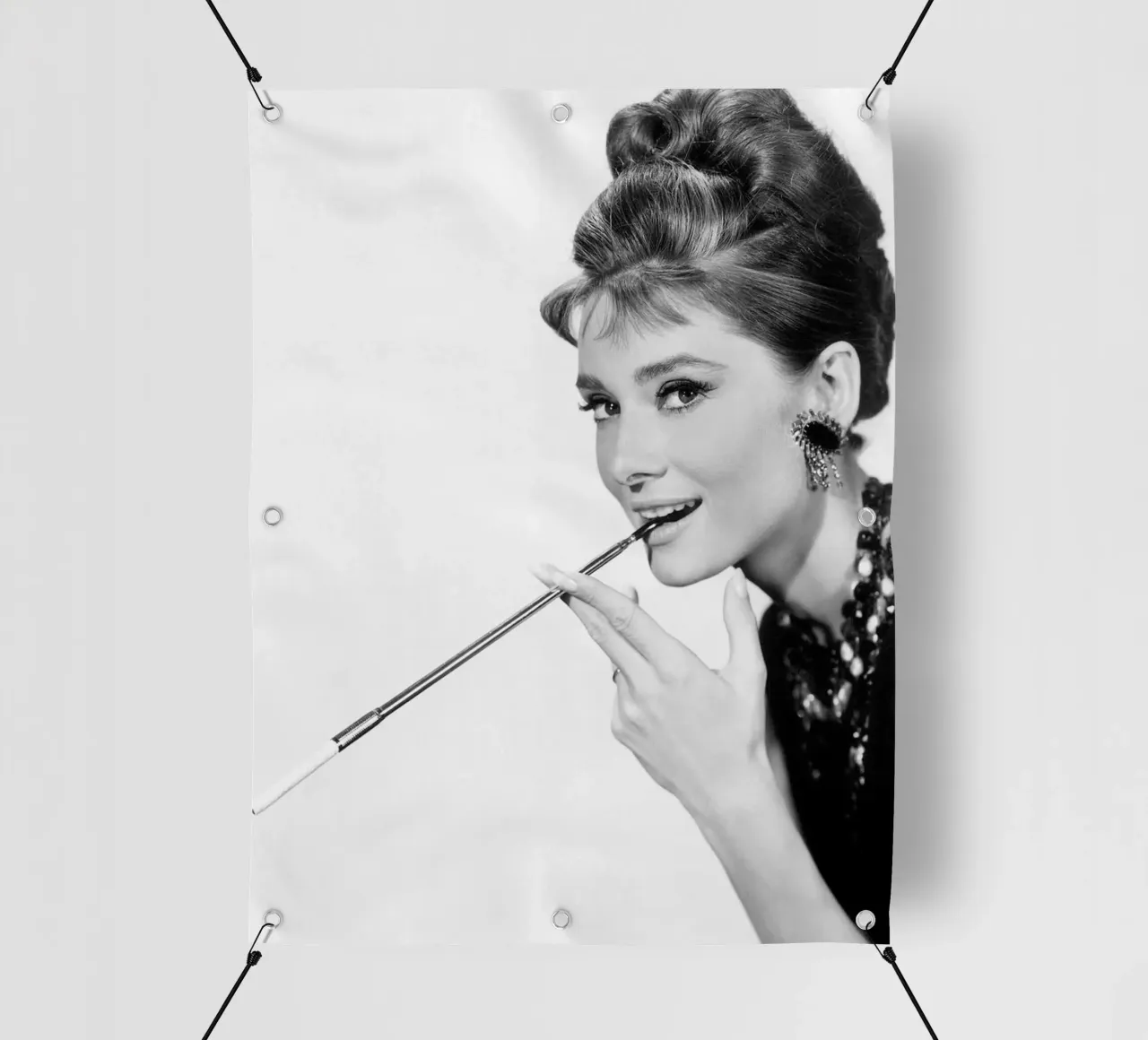 Audrey Hepburn mit Zigarettenspitze PVC Plane von April Lewis
