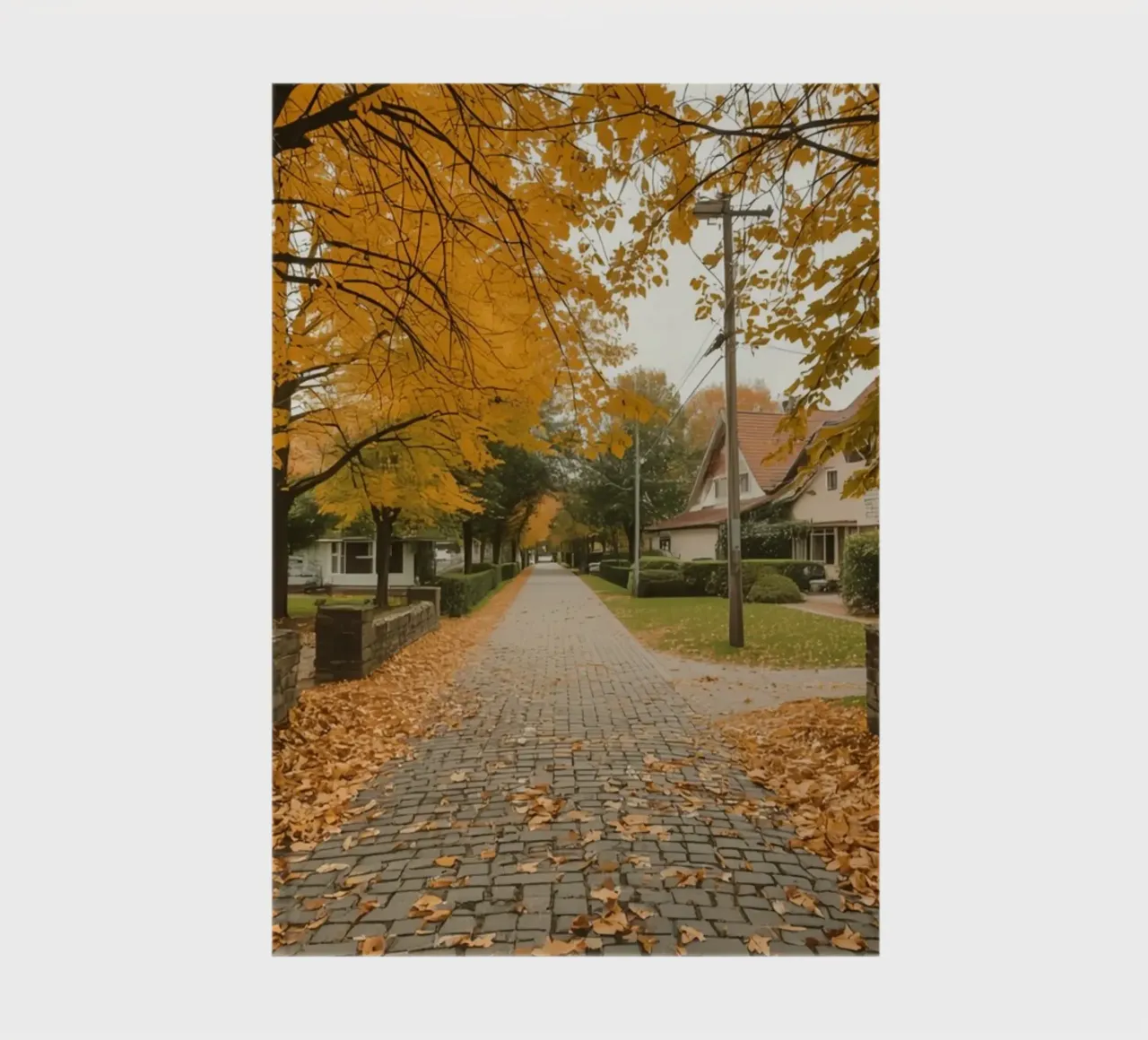 Cobblestone Path Lined with Autumn Trees and Houses notebook by DesignDoodle