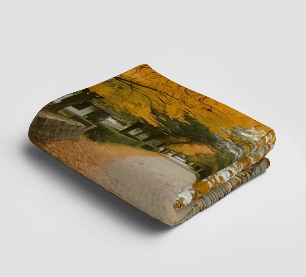 Cobblestone Path Lined with Autumn Trees and Houses towel by DesignDoodle
