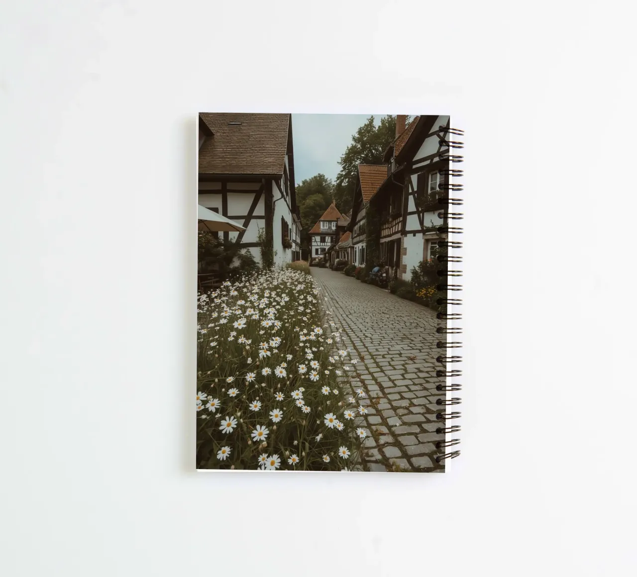 Cobblestone Path Lined with Autumn Trees and Houses spiral notebook by DesignDoodle