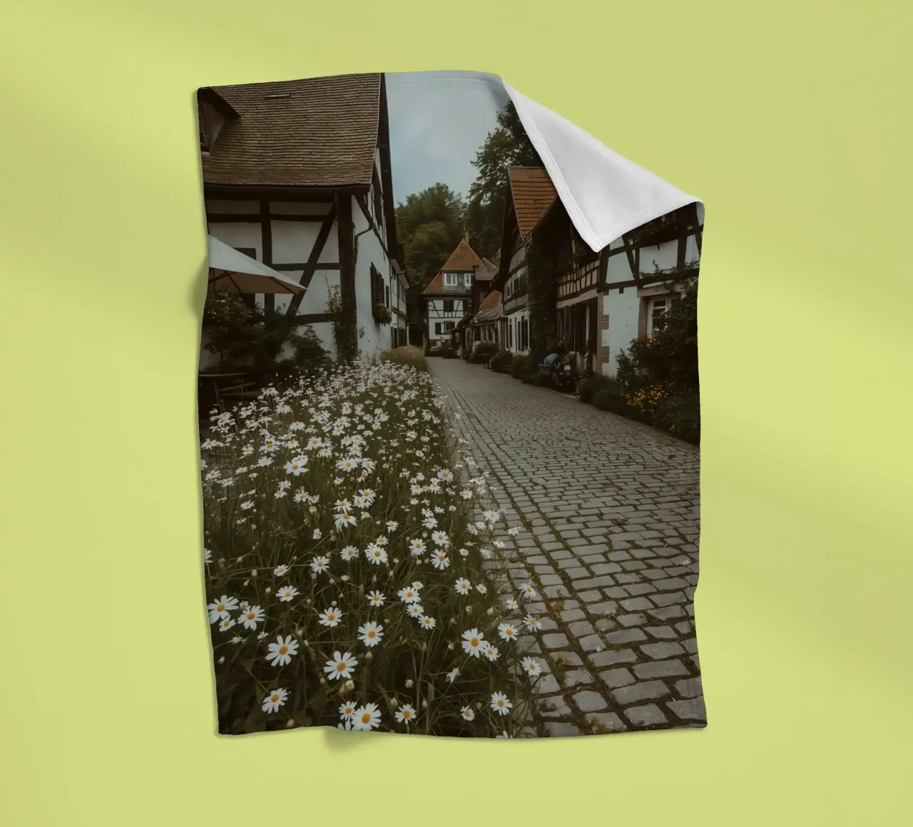 Cobblestone Path Lined with Autumn Trees and Houses fleece blanket by DesignDoodle