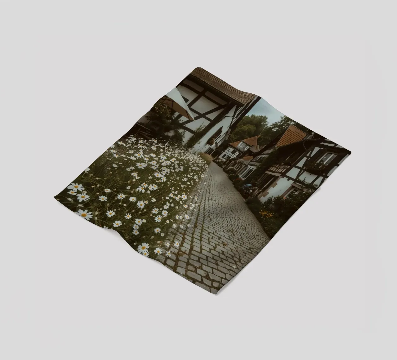 Cobblestone Path Lined with Autumn Trees and Houses fleece blanket by DesignDoodle