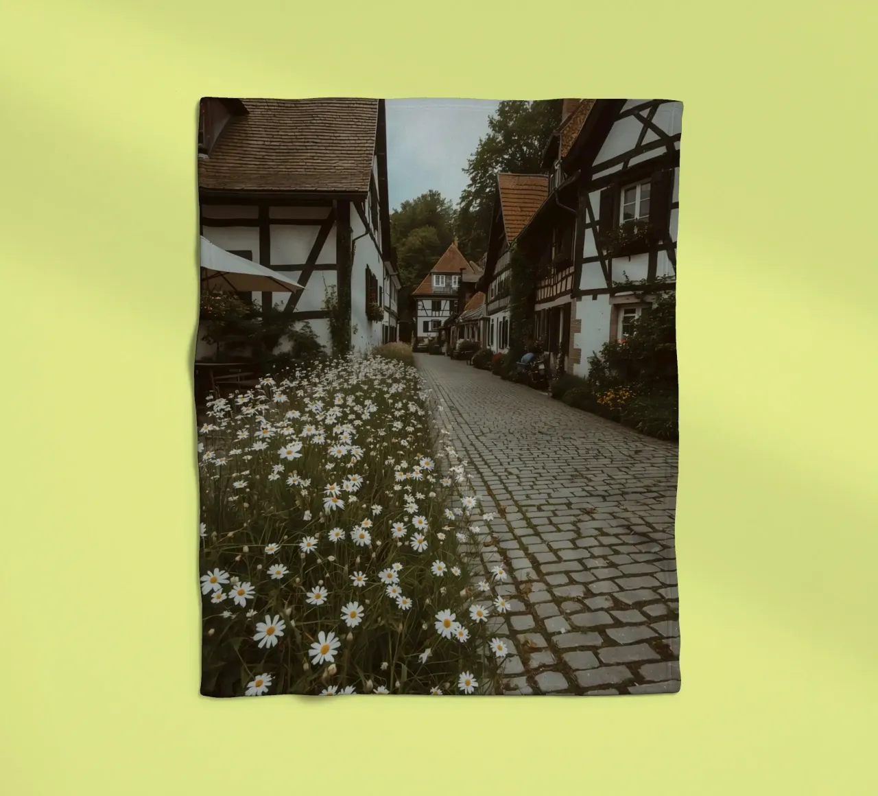 Cobblestone Path Lined with Autumn Trees and Houses fleece blanket by DesignDoodle
