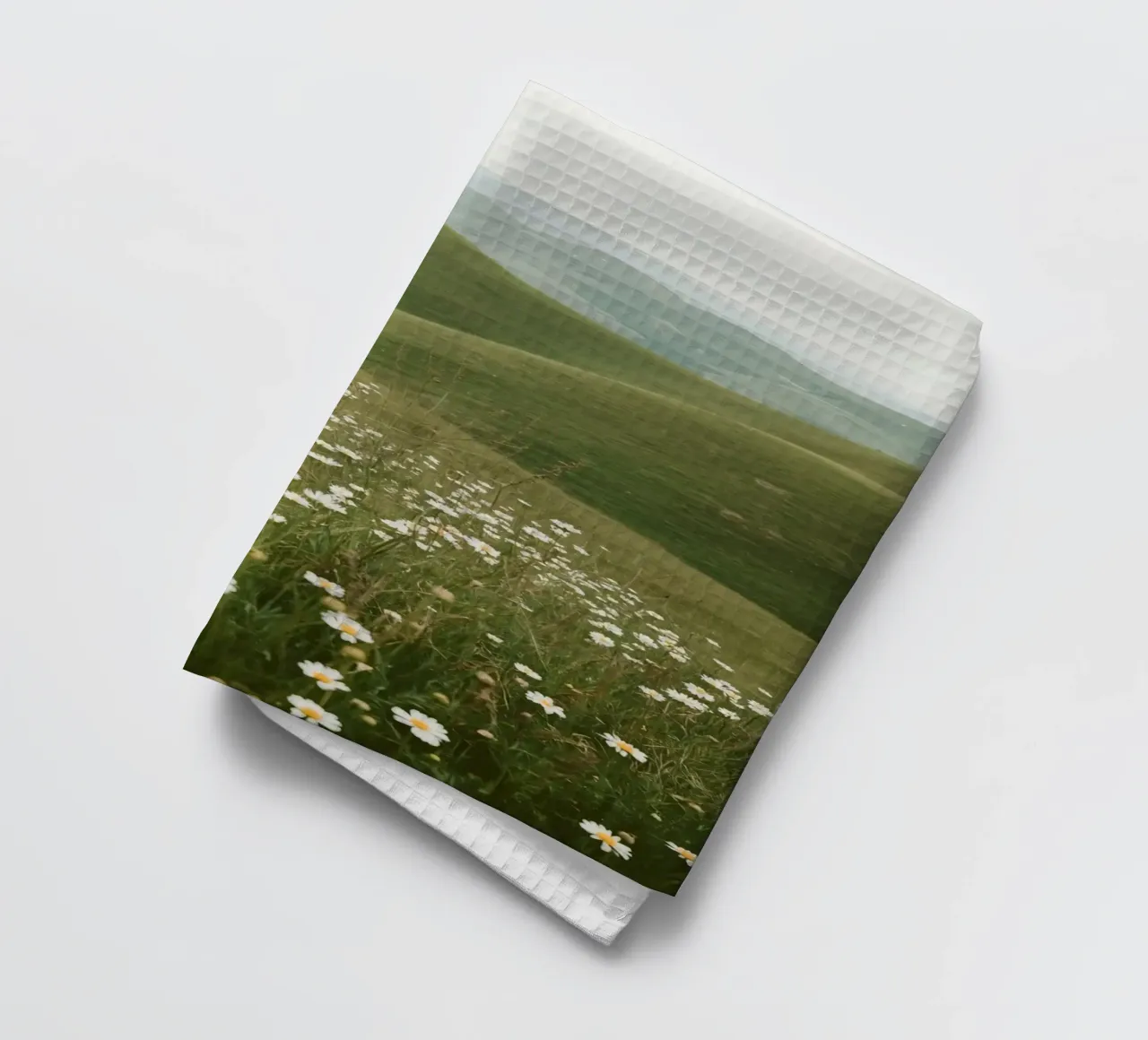 Campo di margherite con colline ondulate canovaccio da cucina da DesignDoodle