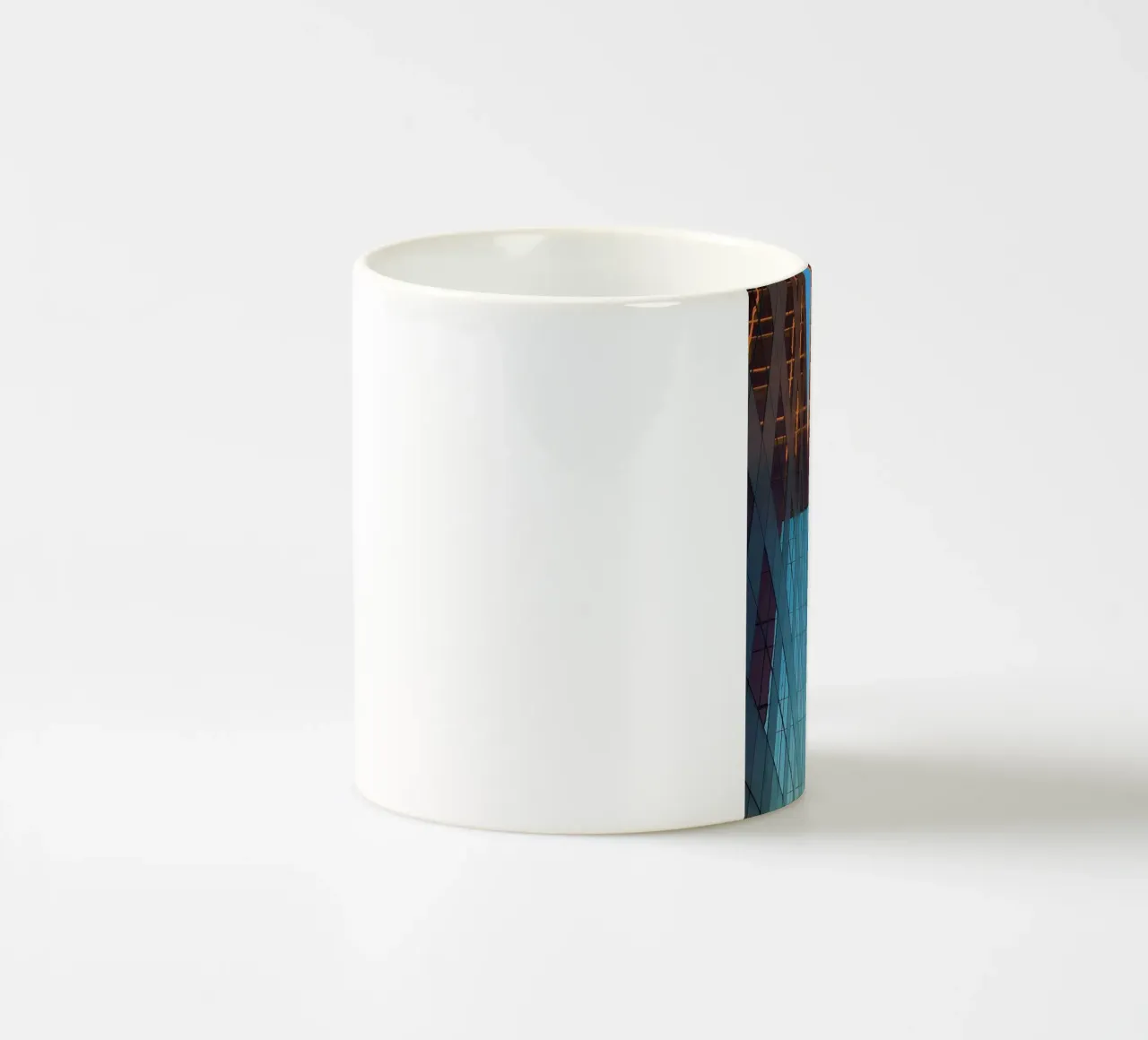 mirror the building tazza in ceramica da comura