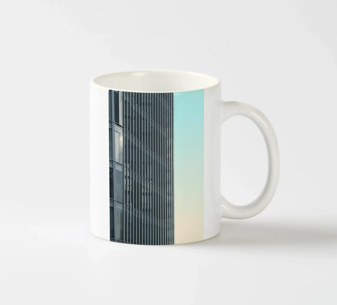 building in afternoon sky tazza in ceramica da comura