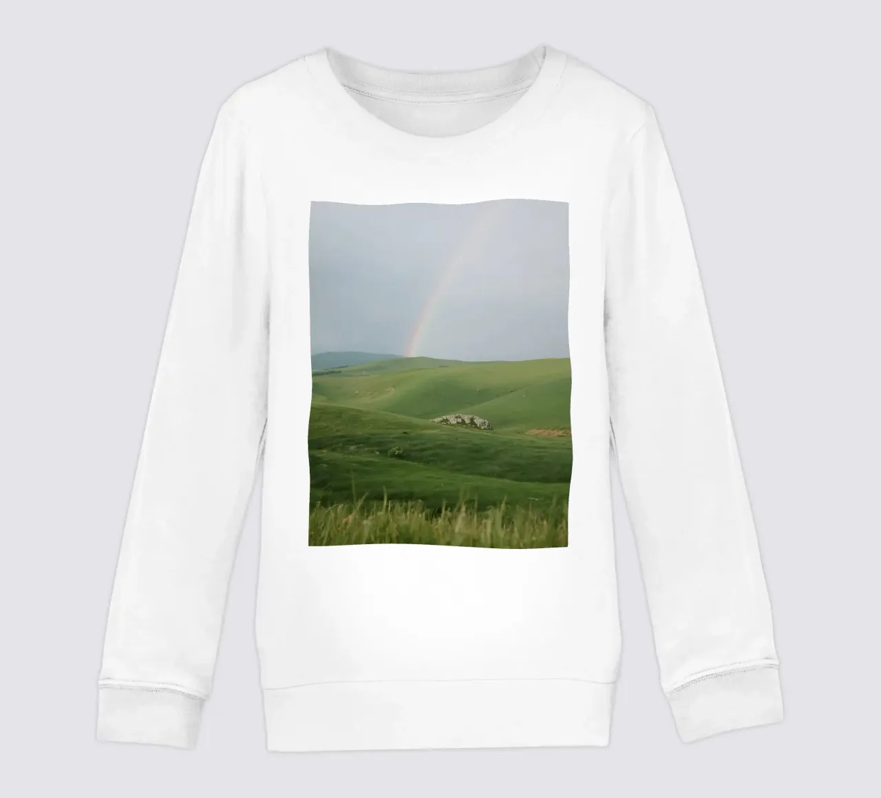 Colline verdi con arcobaleno e rocce felpa bambino da DesignDoodle