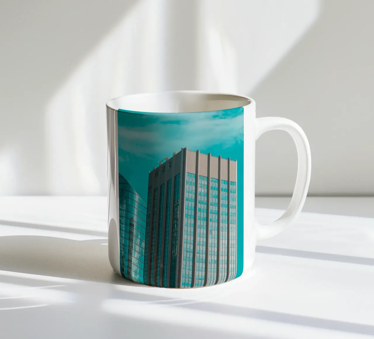 light on blue sky building tazza in ceramica da comura