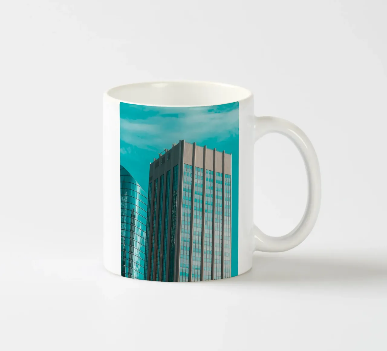 light on blue sky building tazza in ceramica da comura