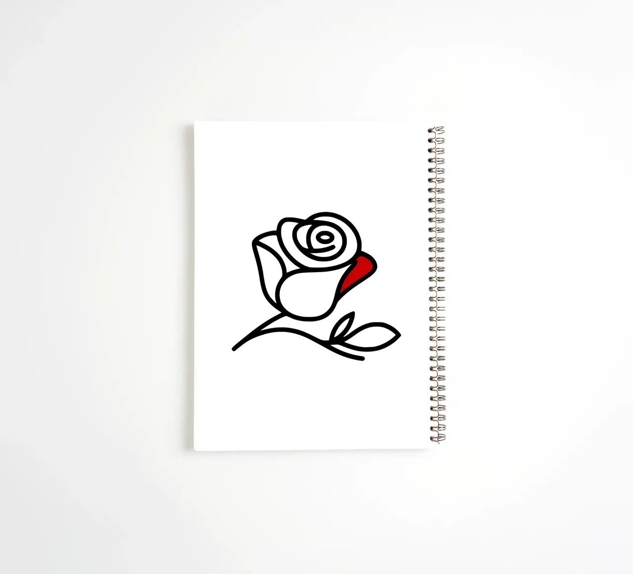 Minimalist reclining rose with a red leaf spiral notebook by Bold & Simple