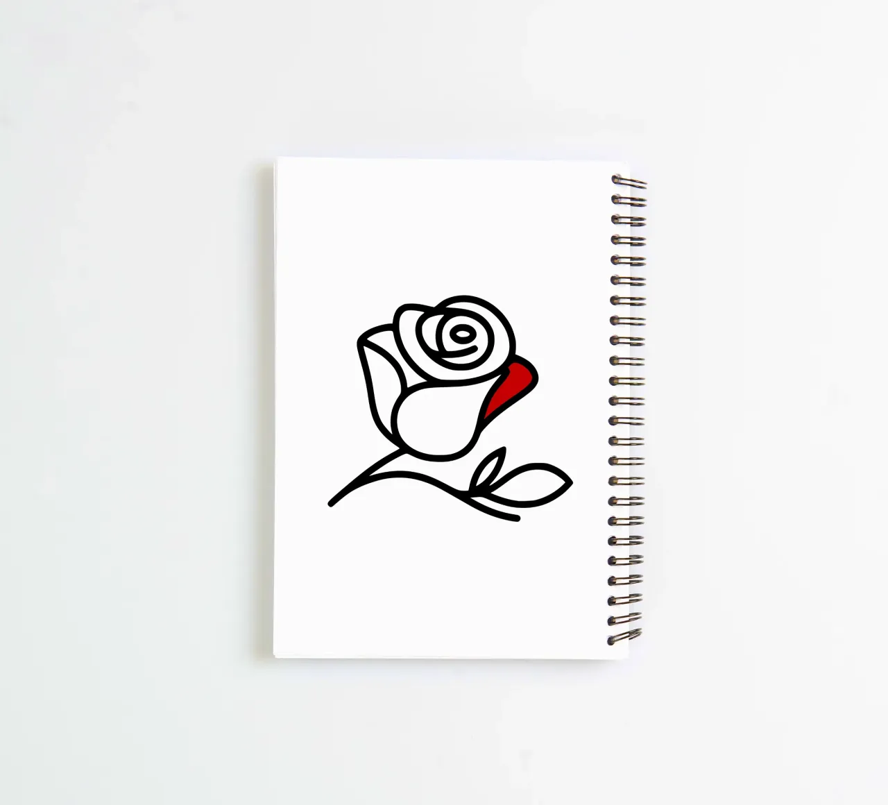 Minimalist reclining rose with a red leaf spiral notebook by Bold & Simple