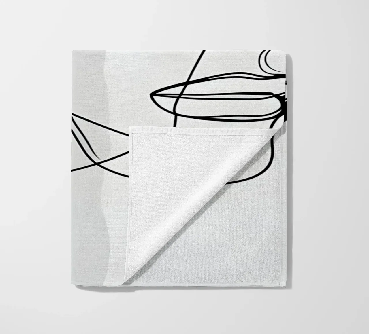 Line art a mezza faccia telo mare da LIFESTYLE OBJECTS