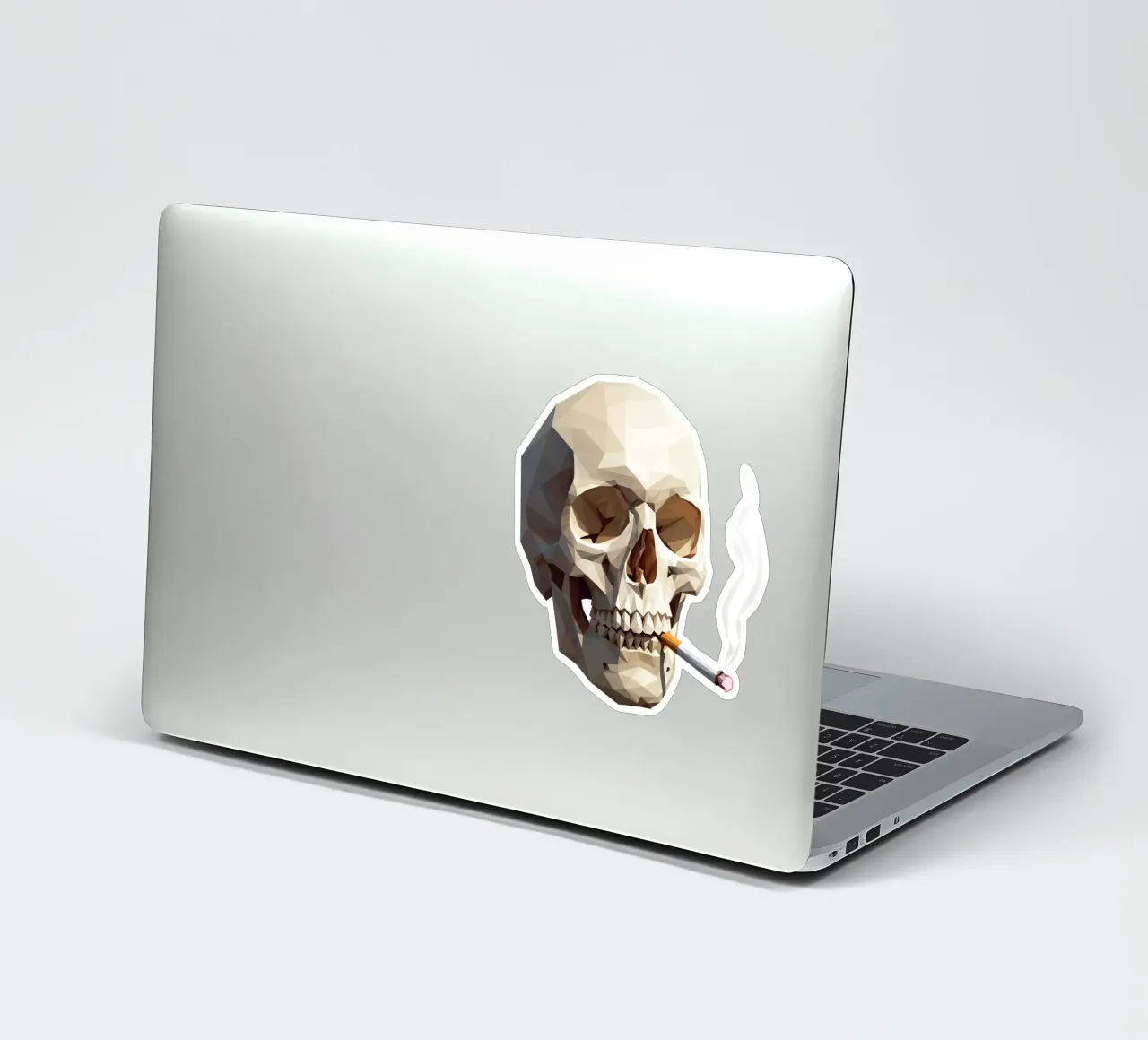 Cranio di uno scheletro con sigaretta accesa adesivo da Low Profile