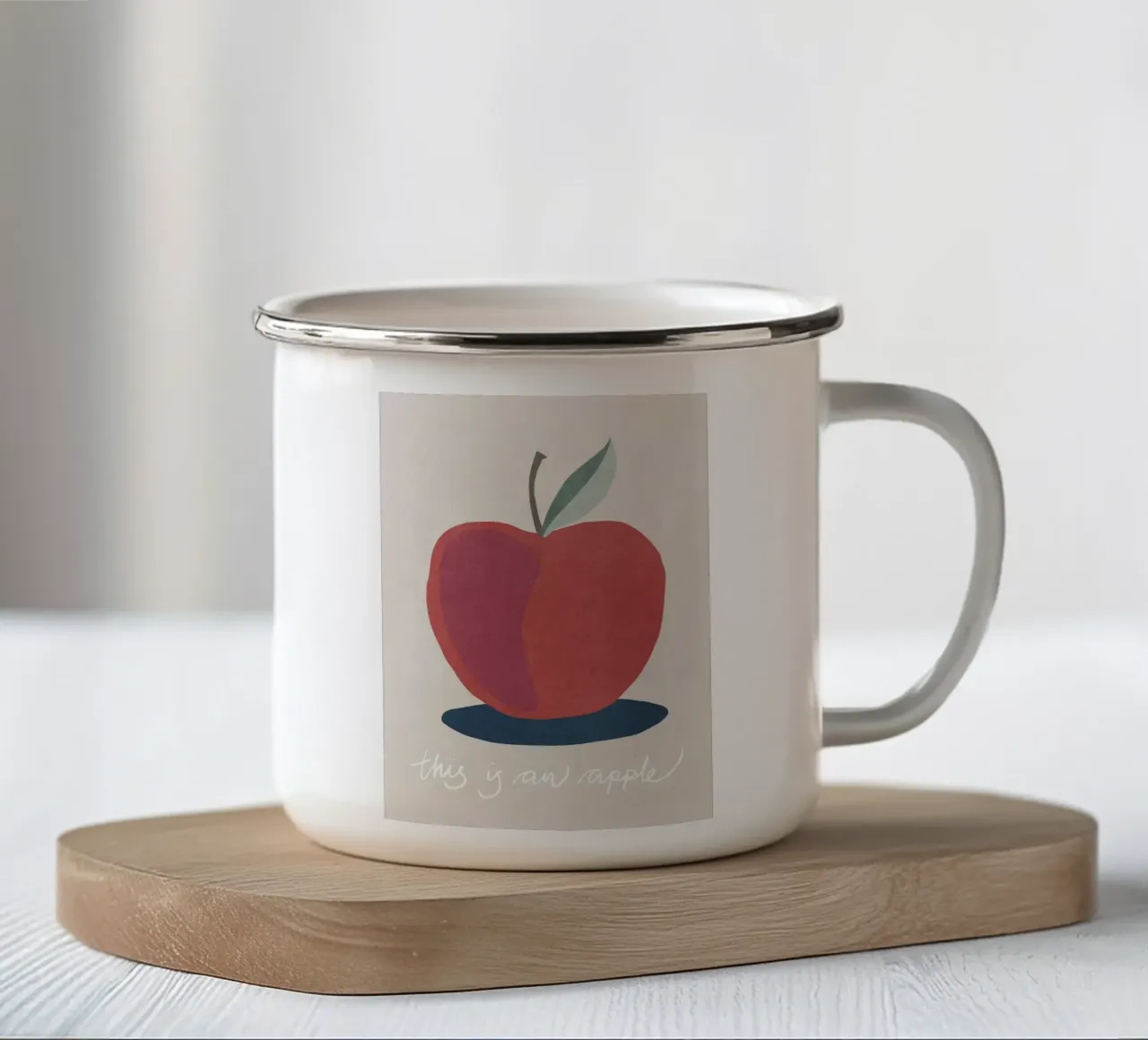 Questa è una Apple tazza in smalto da Charlotte Gagnon