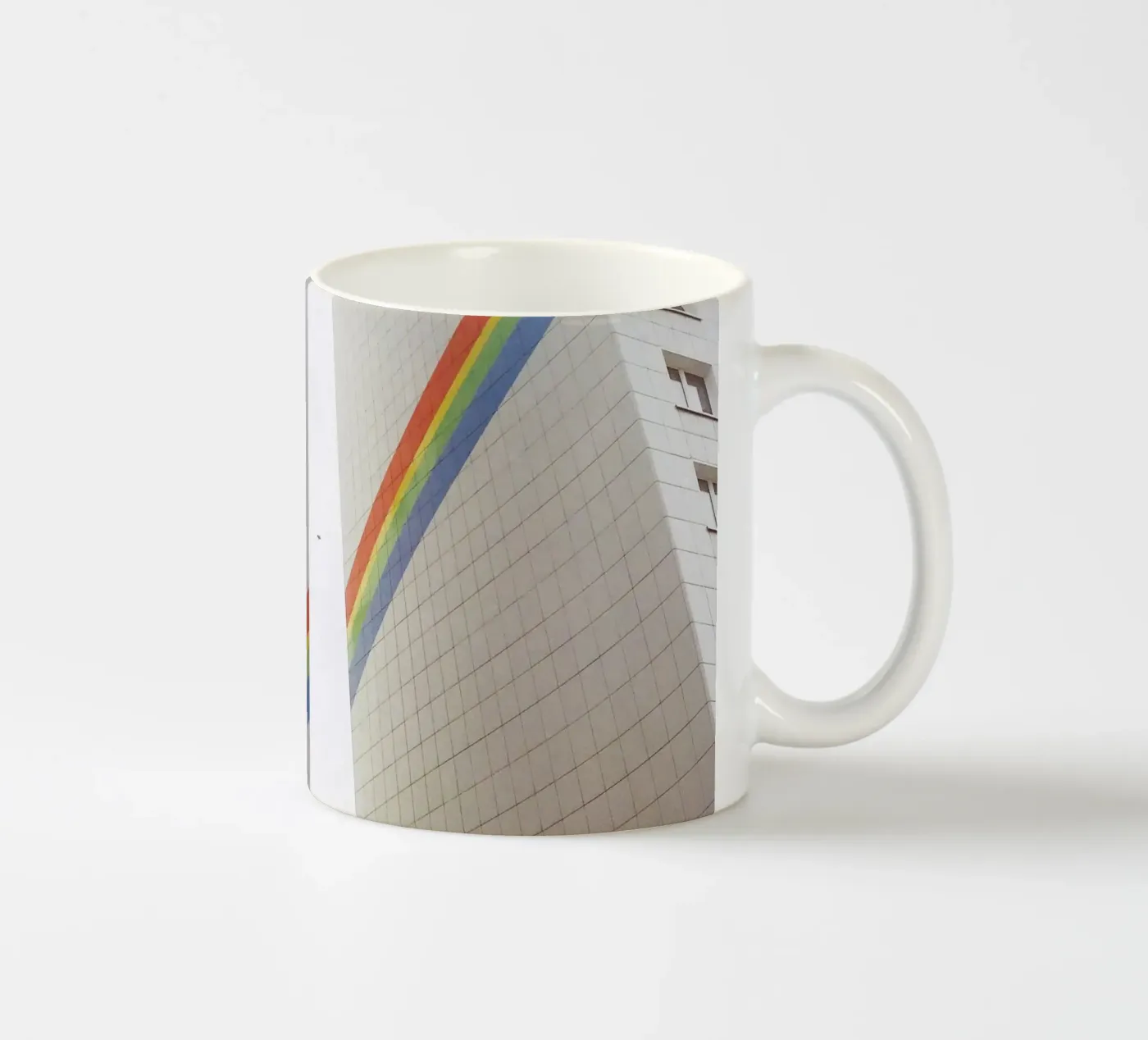 Rainbow ceramic mug by Cassia Beck Photography