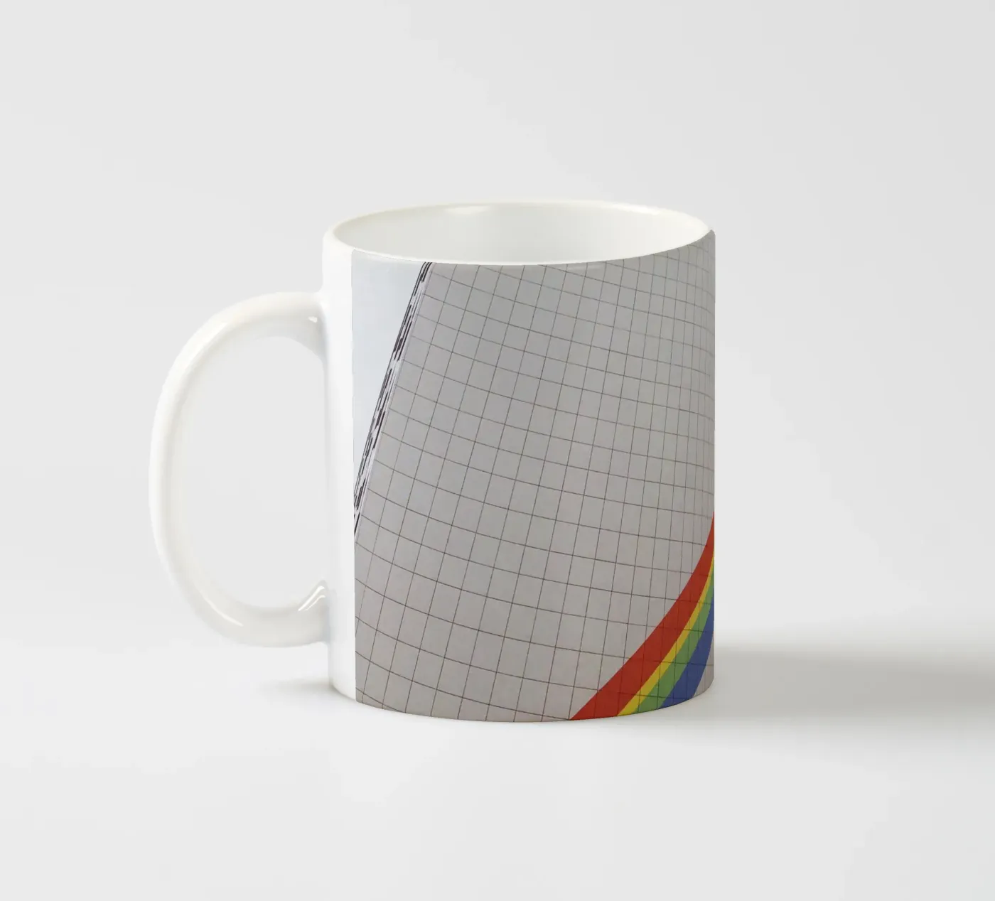 Rainbow ceramic mug by Cassia Beck Photography