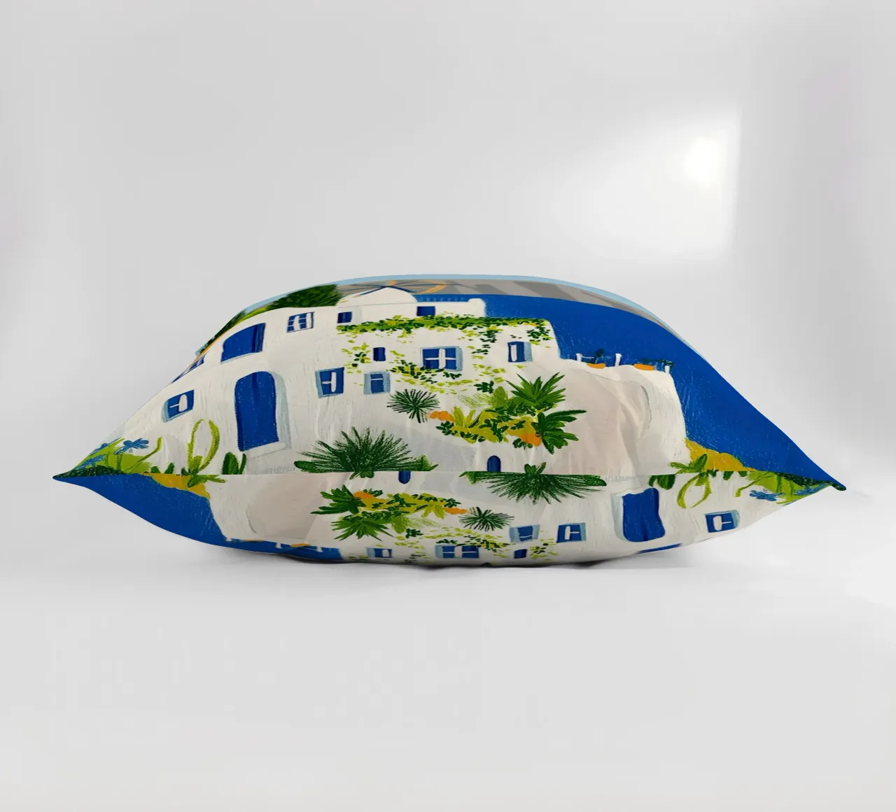 Santorini con fiori gialli cuscino da Curious Canvas