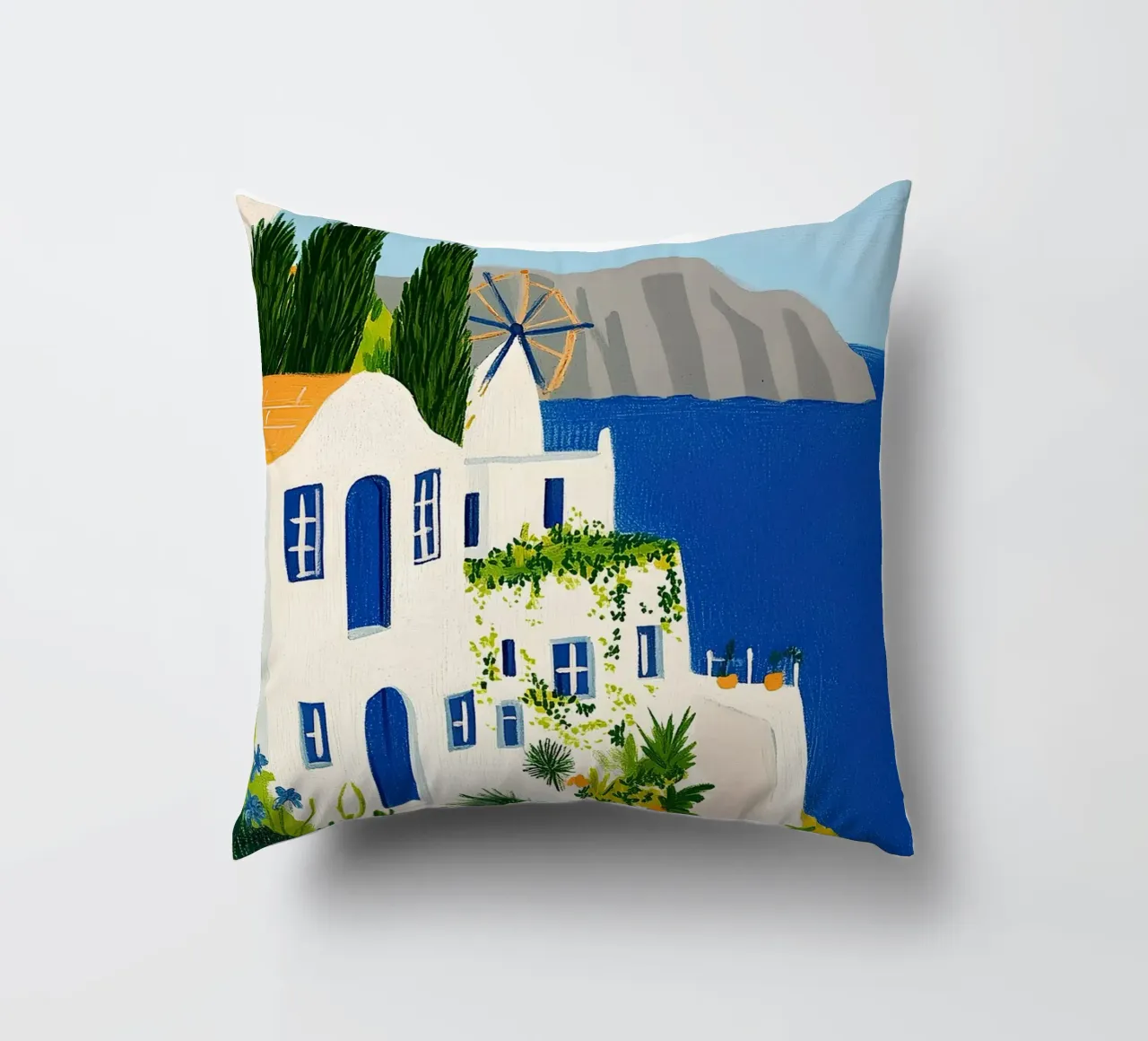 Santorini con fiori gialli cuscino da Curious Canvas