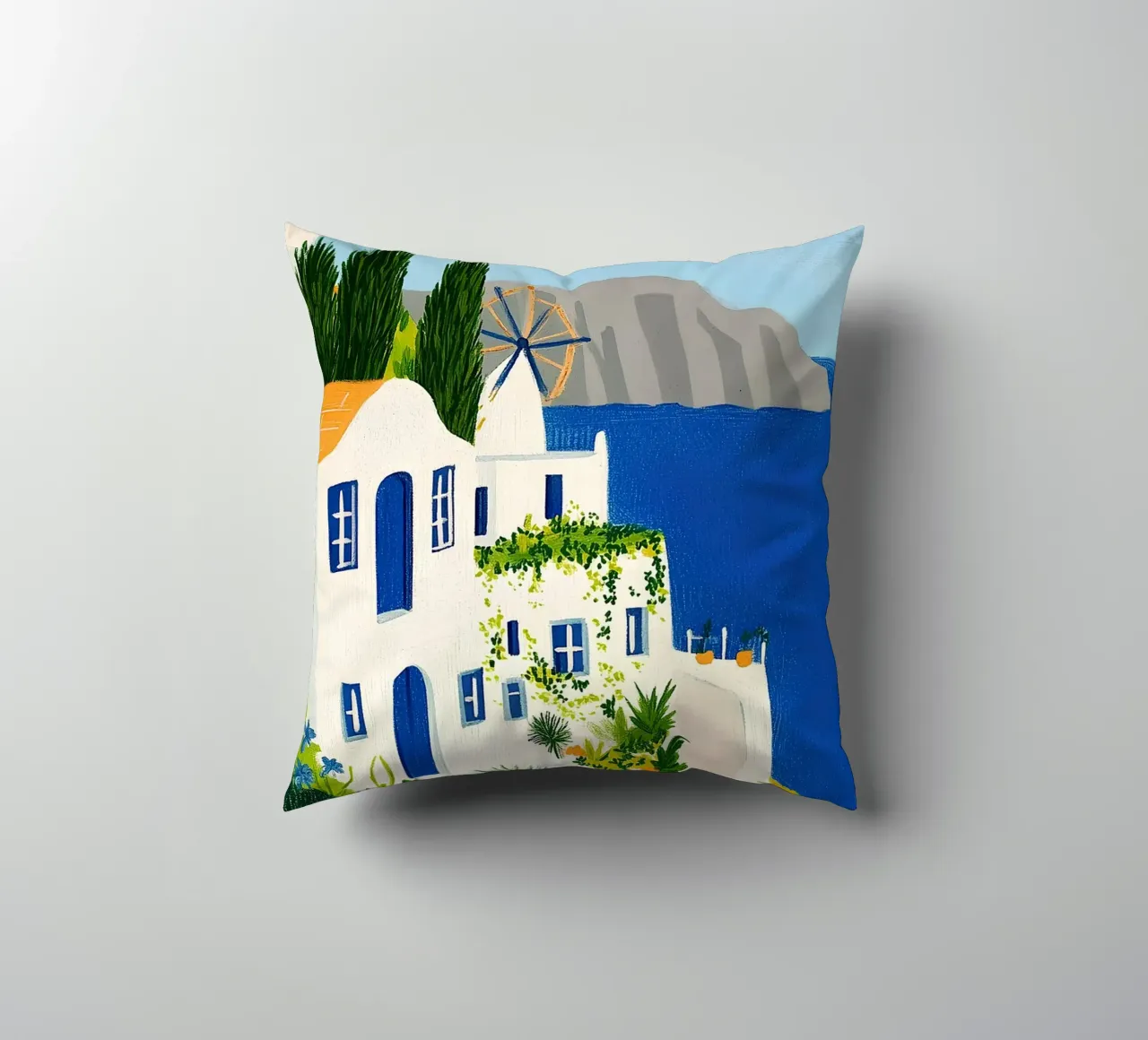 Santorini con fiori gialli cuscino da Curious Canvas