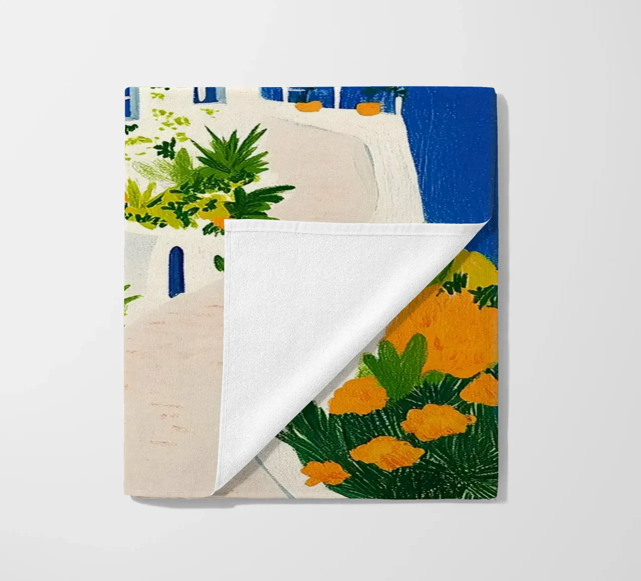 Santorini con fiori gialli telo mare da Curious Canvas