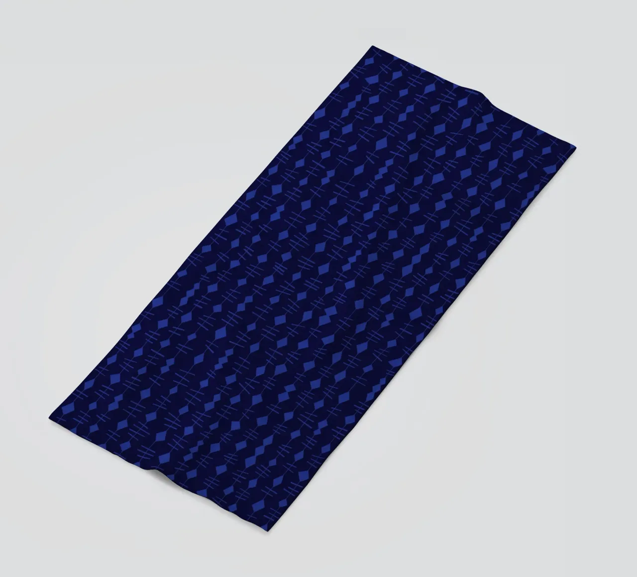 The garland stories beach towel by Lidia Blomgren