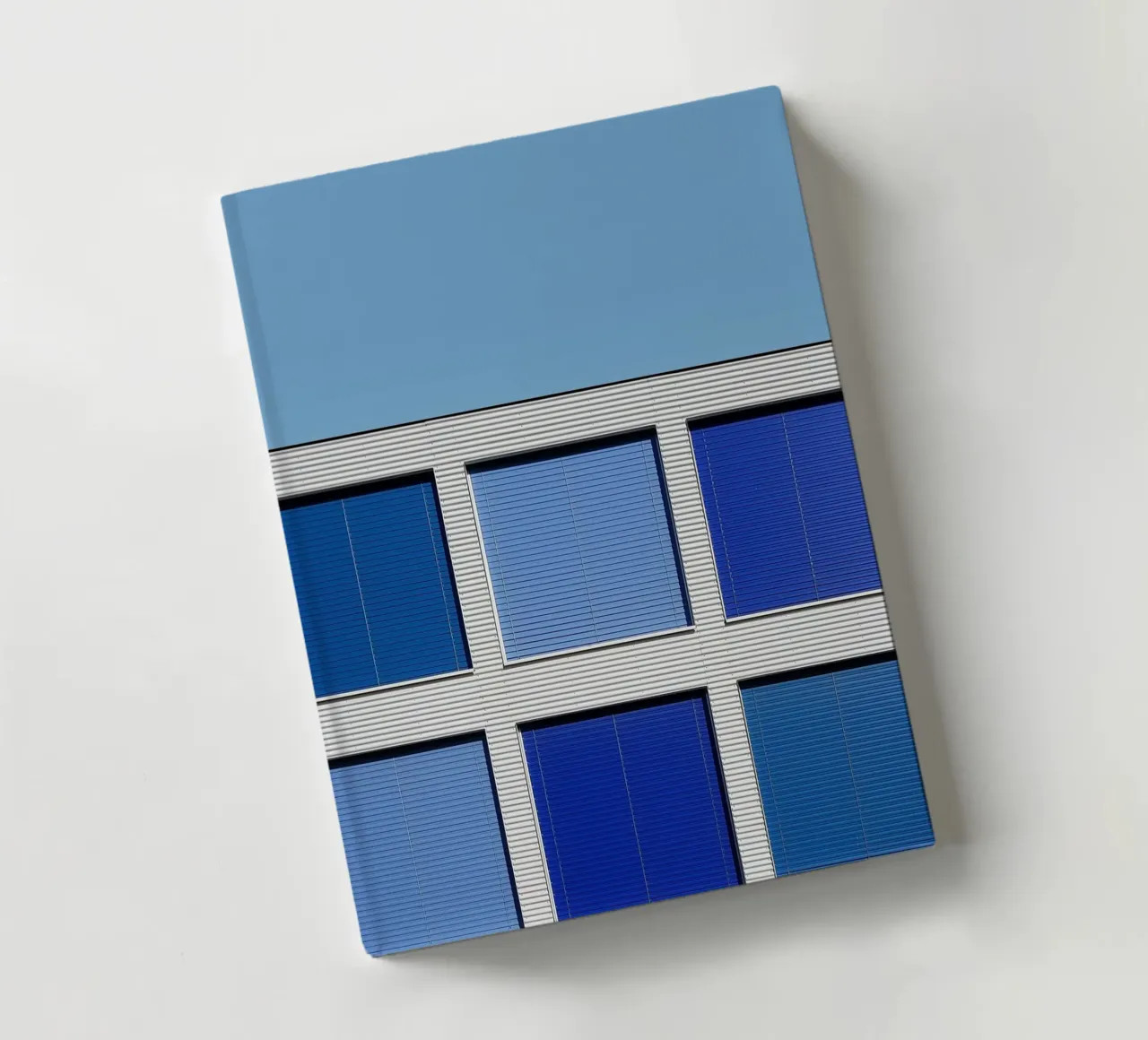 gradient square on building notebook by comura