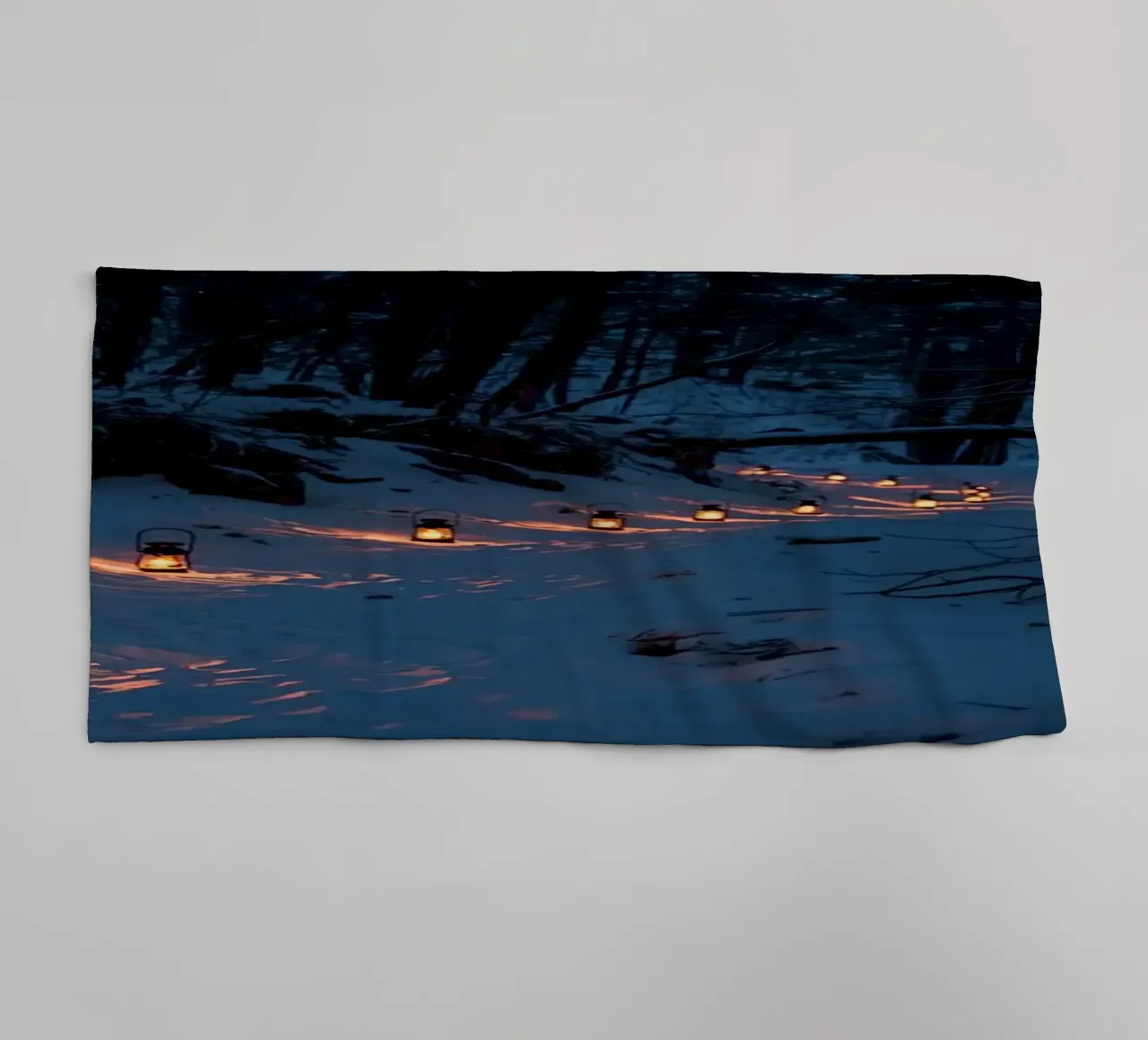 Snowy Forest Path Lined with Lanterns towel by DesignDoodle