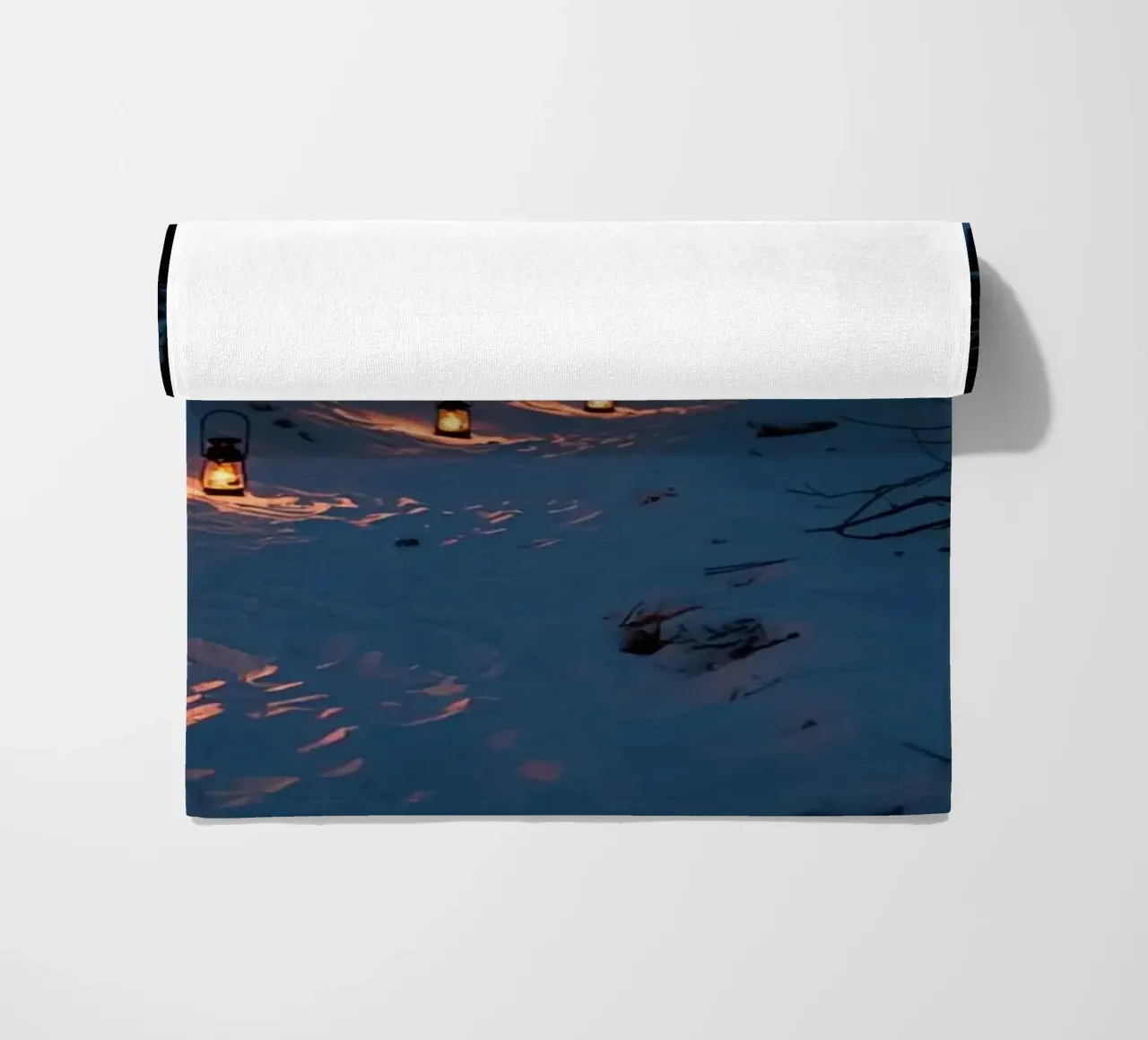 Snowy Forest Path Lined with Lanterns beach towel by DesignDoodle