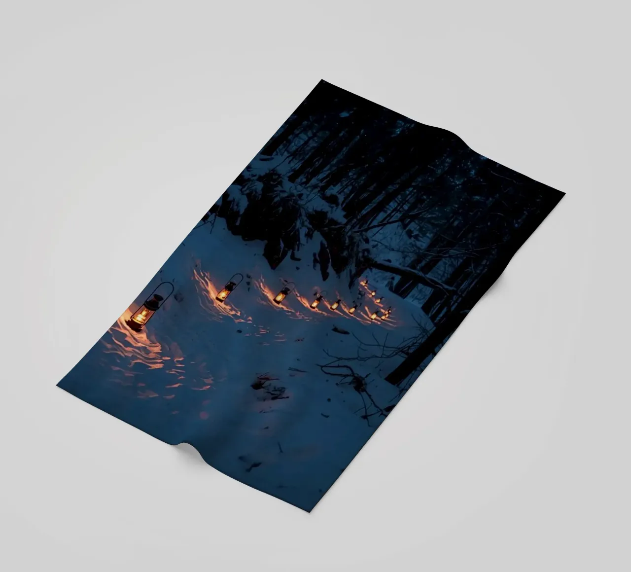 Snowy Forest Path Lined with Lanterns beach towel by DesignDoodle