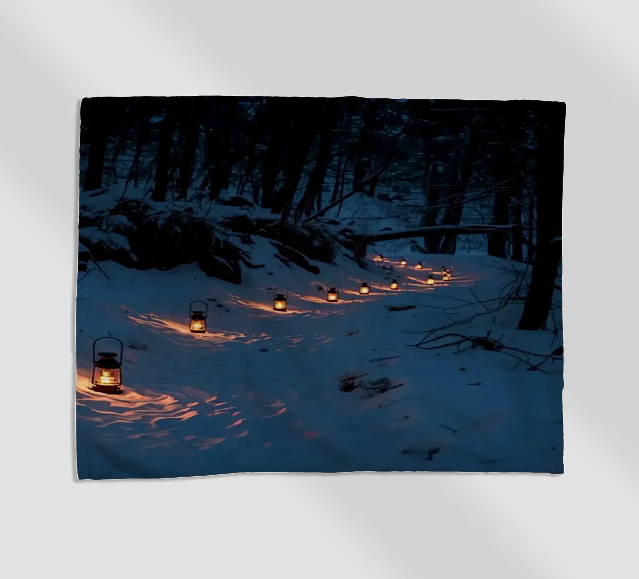 Snowy Forest Path Lined with Lanterns beach towel by DesignDoodle