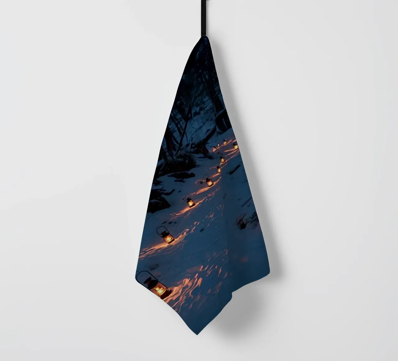 Snowy Forest Path Lined with Lanterns tea towel by DesignDoodle