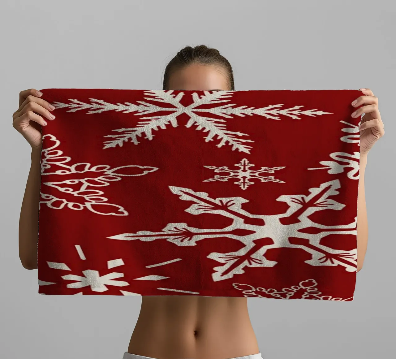 Red Background with White Snowflakes in Festive Winter Style towel by Stilrausch