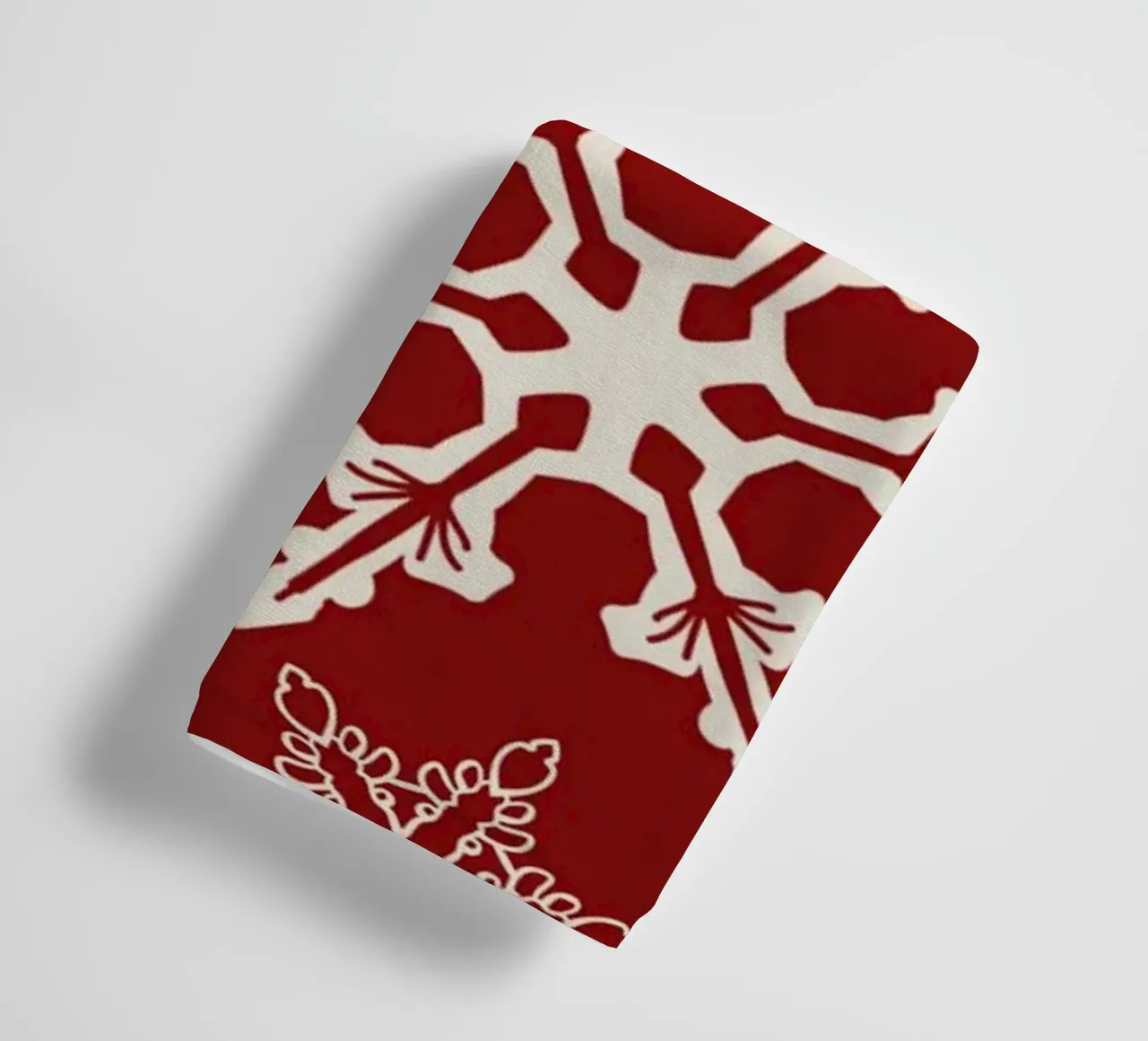 Red Background with White Snowflakes in Festive Winter Style towel by Stilrausch