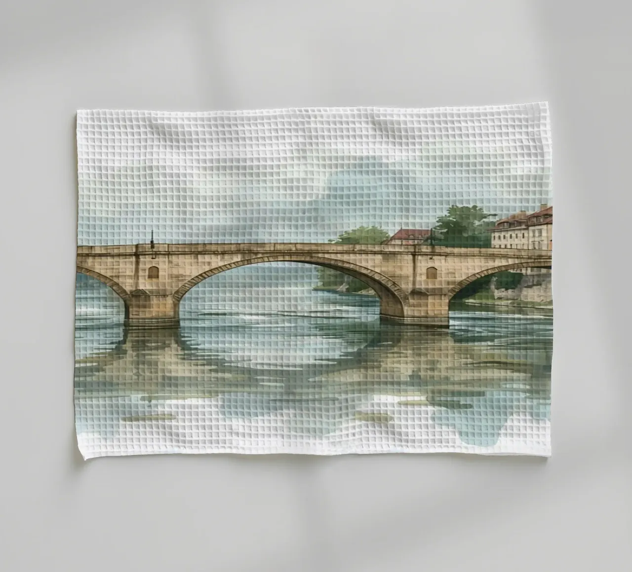 Ponte di pietra sul fiume con edifici e alberi canovaccio da cucina da DesignDoodle