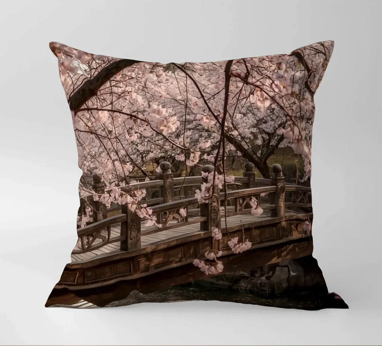 Ponte ad arco in legno con fiori di ciliegio in fiore cuscino da DesignDoodle