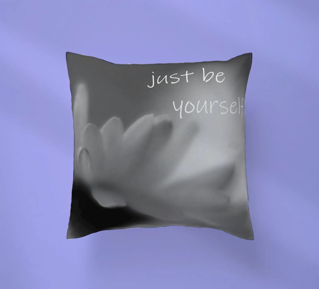 Un piccolo fiore in bianco e nero con la scritta cuscino da Something for you