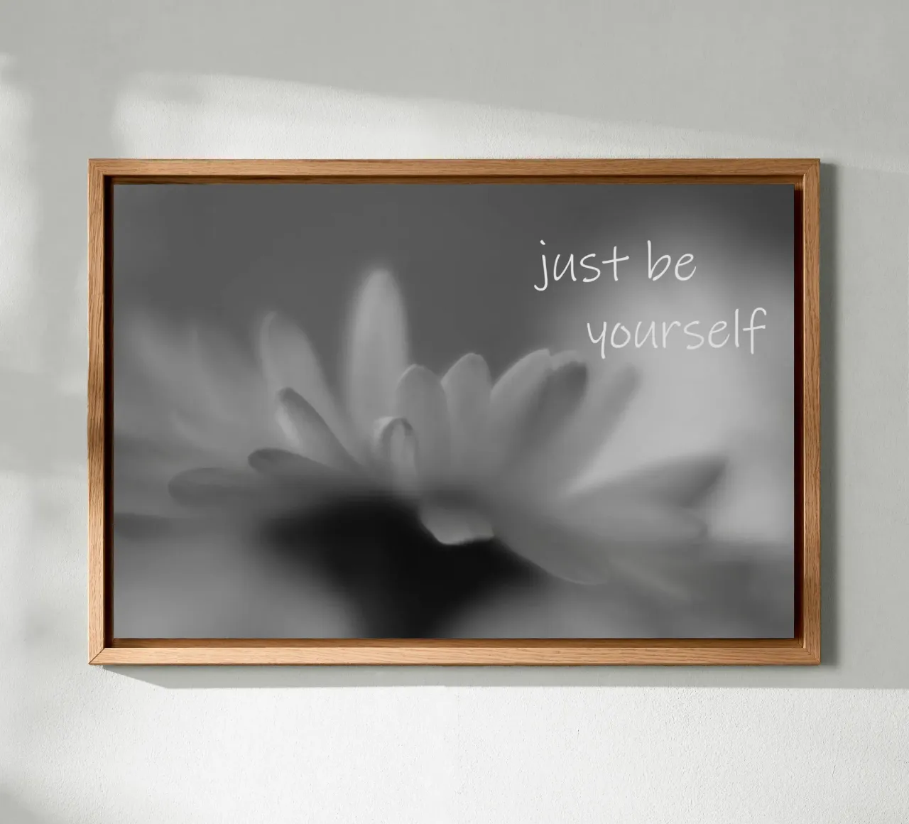Un piccolo fiore in bianco e nero con la scritta tela con Cornice a cassetta da Something for you