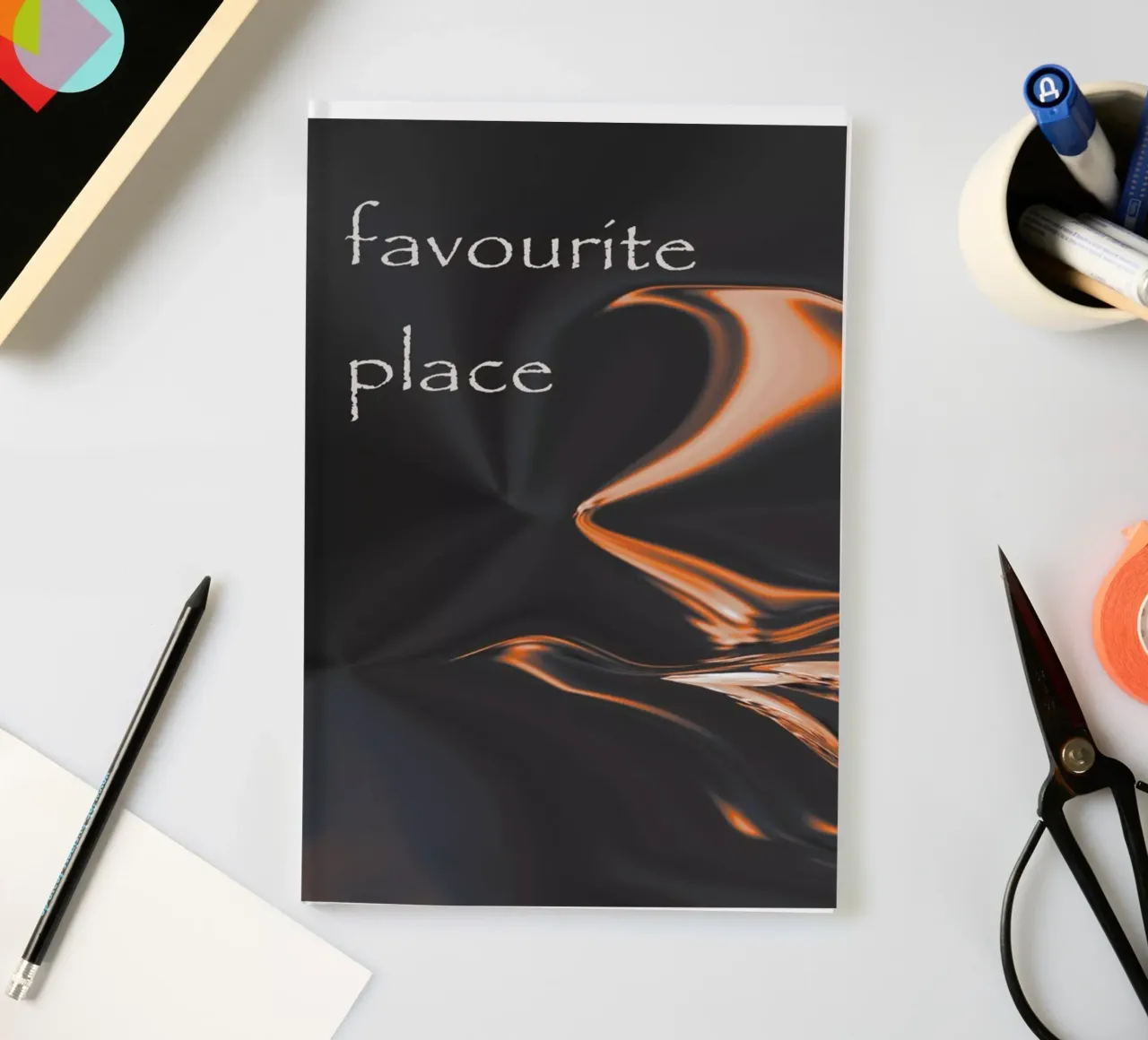 Abstract pattern in orange and black. With a saying notebook by Something for you