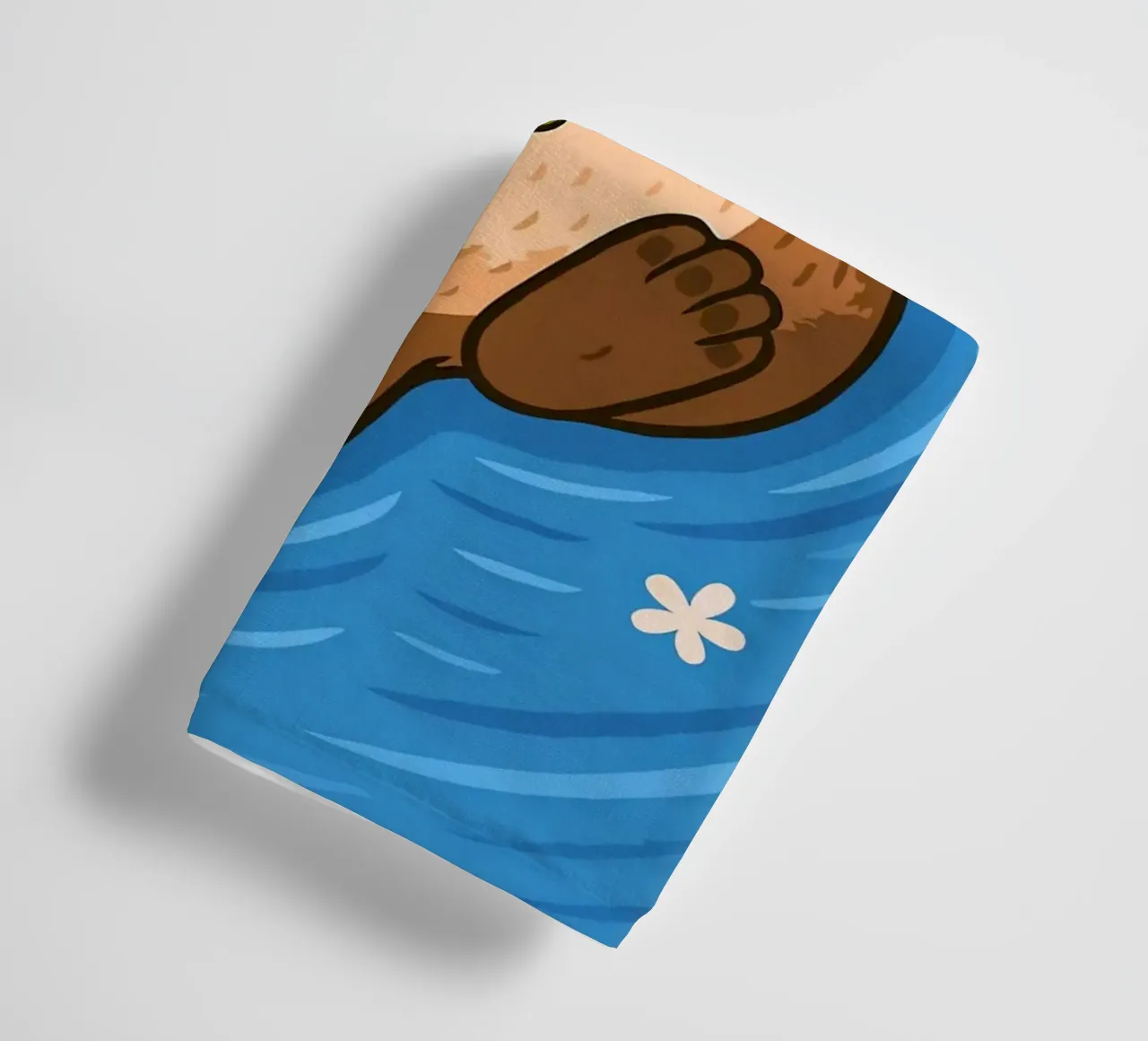 Floating Otter with a Flower towel by Liam Johnson