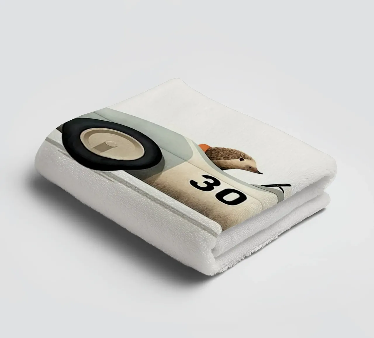 Hérisson dans une voiture jouet serviette de bain de Emil Art Studio