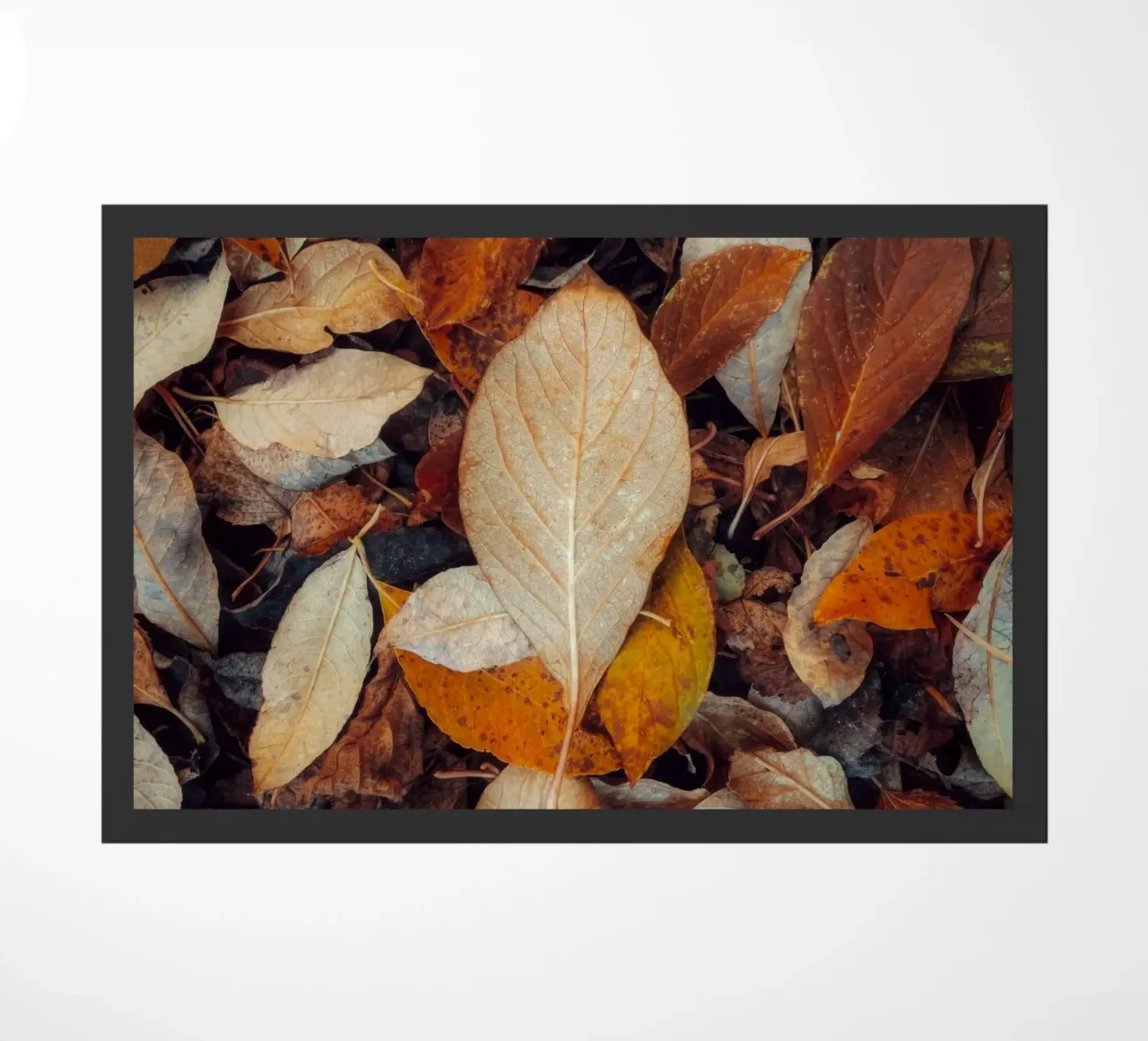 a red leaf doormat by Earthly Visions